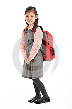 Studio Shot Of Chinese Girl In School Uniform