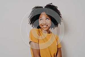 Studio shot close up portrait of casually dressed african american girl with funny face expression