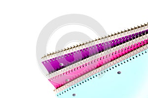 Studio shot colorful spiral 1-subject notebooks isolated on whit