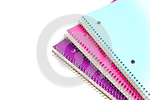 Studio shot colorful spiral 1-subject notebooks isolated on whit