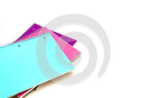 Studio shot colorful spiral 1-subject notebooks isolated on whit