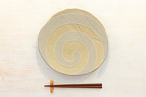 Empty Japanese dish with chopsticks