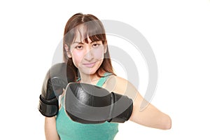 Female boxer throws a left hook