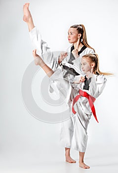 The studio shot of group of kids training karate martial arts