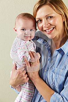 Studio Shot Of Happy Mother and Baby