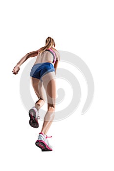 The studio shot of high jump female athlete is in action