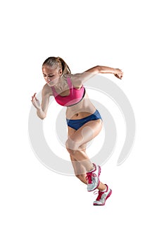 The studio shot of high jump female athlete is in action