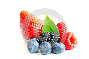 Studio shot mixed berries isolated on white