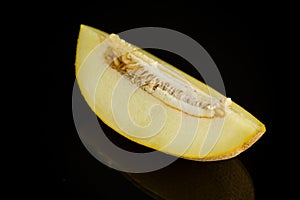 Studio shot of notched ripe melon galia with slice