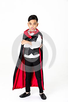 Studio shot portrait of kid boy in costume dressed as a hallow