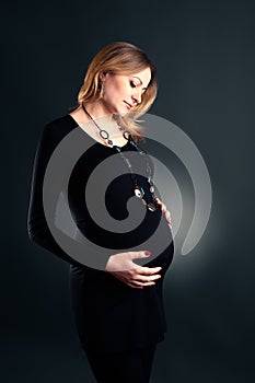 Studio shot of pregnant woman