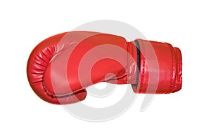 A studio shot of a red boxing glove isolated