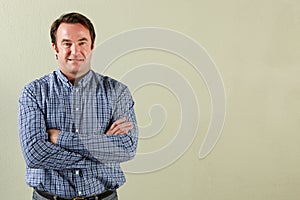 Studio Shot Of Relaxed Middle Aged Man