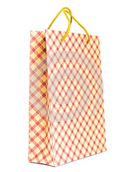 Studio shot single paper shopping bag with handles isolated on white