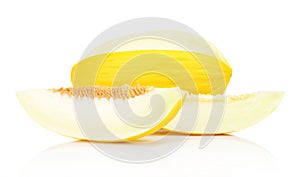 Studio shot of sliced Canary melon isolated white