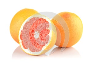 Studio shot sliced some grapefruits isolated white