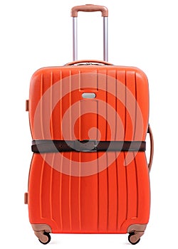 Studio shot of squished orange suitcase photo