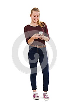 Studio Shot Of Teenage Girl Sending Text Message