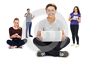 Studio Shot Of Teenagers Using Communication Technology