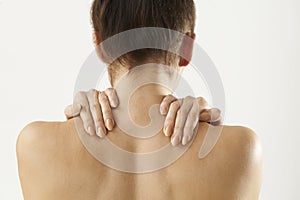 Studio Shot Of Woman With Painful Neck