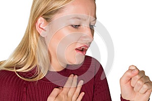 Studio Shot Of Young Woman Suffering With Cough photo