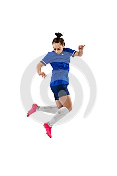 Studio shot of young female soccer, football player workout isolated on white studio background. Sport, action, motion