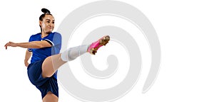 Studio shot of young female soccer, football player workout isolated on white studio background. Sport, action, motion