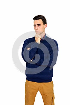 Studio shot of young serious Caucasian man thinking isolated against white background