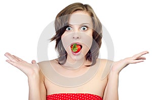 Studio shot of a young woman with strawberry