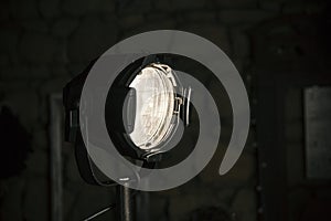 Studio spotlight in the dark
