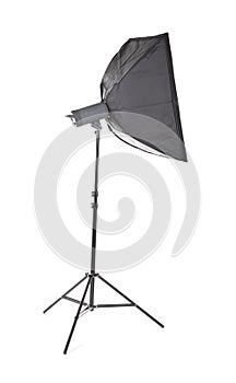 Studio strobe, isolated on a white background. Proffesional photo studio equipment. Studio flash with soft-box.