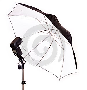 Studio strobe with umbrella isolated