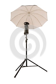 Studio strobe with umbrella isolated on the white