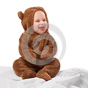 Studio, toddler and onesie with costume, bear and child with joy and fun. Baby, newborn and happiness with adorable
