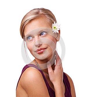 Studio, young woman and thinking with flower by white background for natural skincare with botanicals. Model