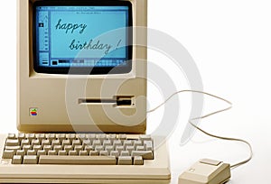 Studioshot of an original Macintosh 128k called Apple Macintosh on white background. This was the first produced Mac, released on