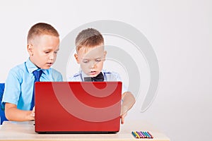 Study on the computer two boys at school