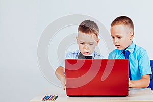 Study on the computer two boys at school