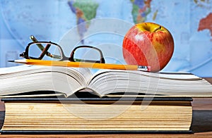 Study Desk With Apple And Books