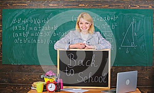 Study and education. Modern school. Knowledge day. teacher with alarm clock at blackboard. Time. Back to school