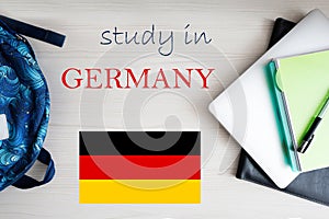 Study in Germany. Background with notepad, laptop and backpack. Education concept
