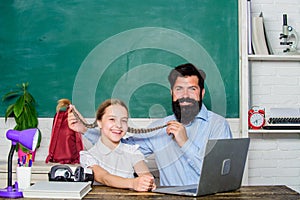 Study modern technologies. Man bearded pedagogue teaching informatics. Homeschooling with father. Find buddy to help you