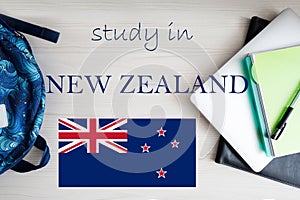 Study in New Zealand. Background with notepad, laptop and backpack. Education concept