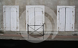 A study of an old wooden doors, shuttered