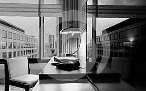 Study room with writing desk armchair and tv set