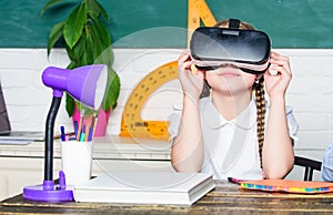 Studying in virtual reality. Modern technology. Interesting lesson. Virtual teaching. Homeschooling online. Girl kid