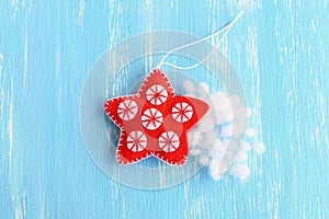 Stuff the felt Christmas star with hollowfiber. Christmas sewing craft. How to teach a child to sew. Tutorial. Step. Top view