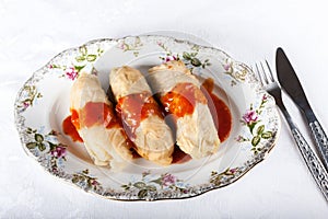 Stuffed cabbage in tomato sauce