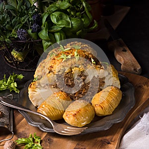 Stuffed cauliflower with mince and Hasselback potatoes