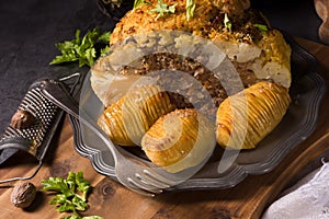 Stuffed cauliflower with mince and Hasselback potatoes